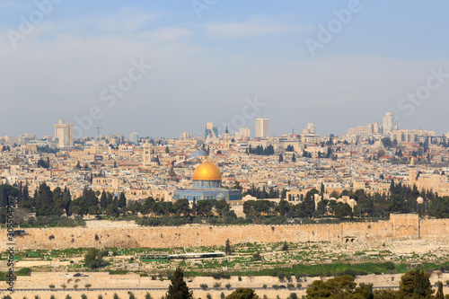 Jerusalem Old city cityscape panorama with Dome of the Rock with gold leaf on Temple Mount and Rotunda of Church of the Holy Sepulchre, Israel