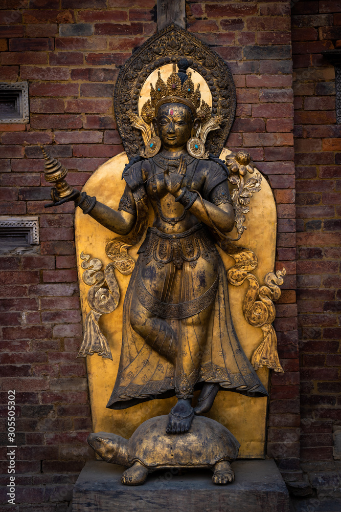 ancient statue of the river goddess Ganga at Mul Chowk, Royal Palace in Patan, Kathmandu Valley, Nepal, Asia, Himalayan Country, Himalayas.