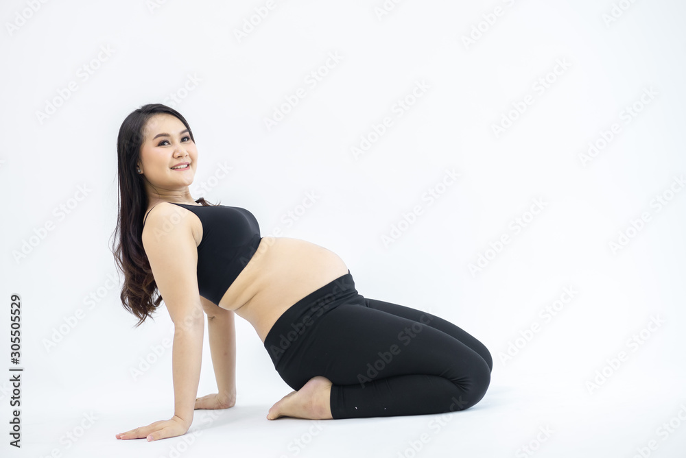 Pregnant women exercising separately from the white backdrop - yoga concepts for pregnant women Pregnant women exercising separately from the white backdrop - yoga concepts for pregnant women