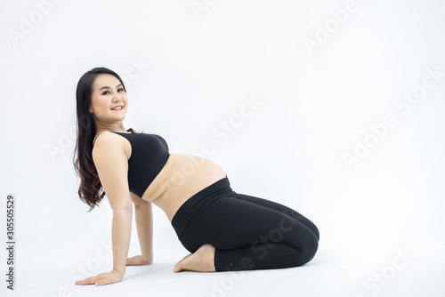 Pregnant women exercising separately from the white backdrop - yoga concepts for pregnant women