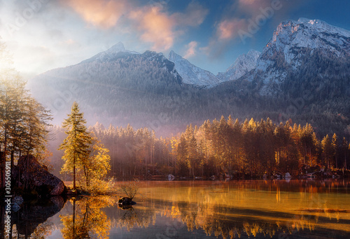 Wonderful Colorful Sunset at Hintersee Lake in Bavarian Alps. Awesome Alpine Highlands during sunrise. Amazing Autumn Natural Background. Incredible Nature Landscape. Beautiful locations of the World.