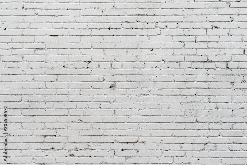 Wall texture of old white rough brick. Grunge surface background. Vintage brickwall. Wall texture of old white rough brick. Grunge surface background. Vintage brickwall.