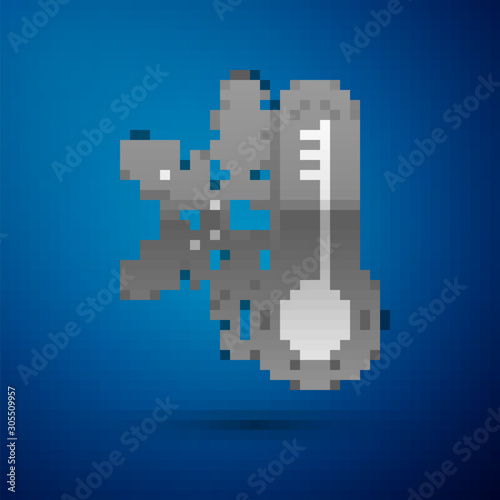 Silver Thermometer with snowflake icon isolated on blue background. Vector Illustration