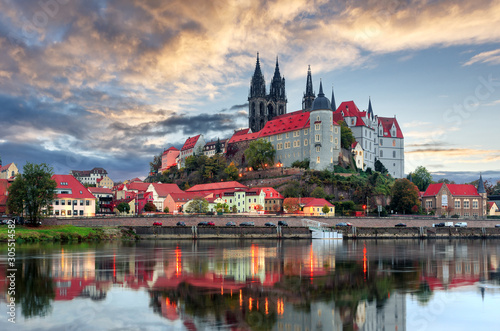 Unsurpassed Colorful Sunset. Wonderful View Albrechtsburg castle and cathedral on the River Elbe in Meissen during golden Hour, Saxony, Germany. Scenic image of townscape. Popular Places photorgaphy