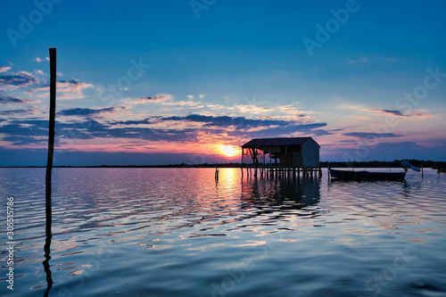 Photos Houses made of wood poles on the sea water in Yumurtalik Lagoon, Adana City, Tur