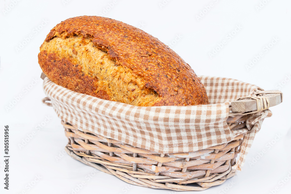 close up of homemade whole wheat organic bread isolated on white background with clipping path. 