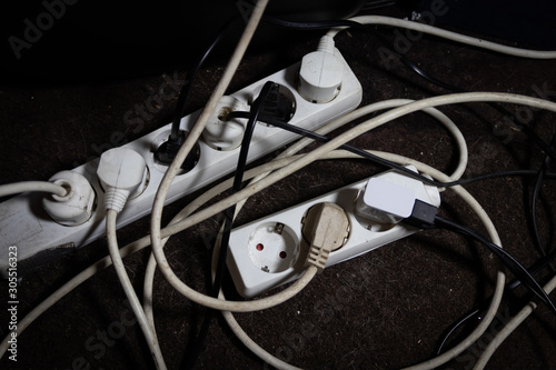 Daisy chained power cords posing fire hazard