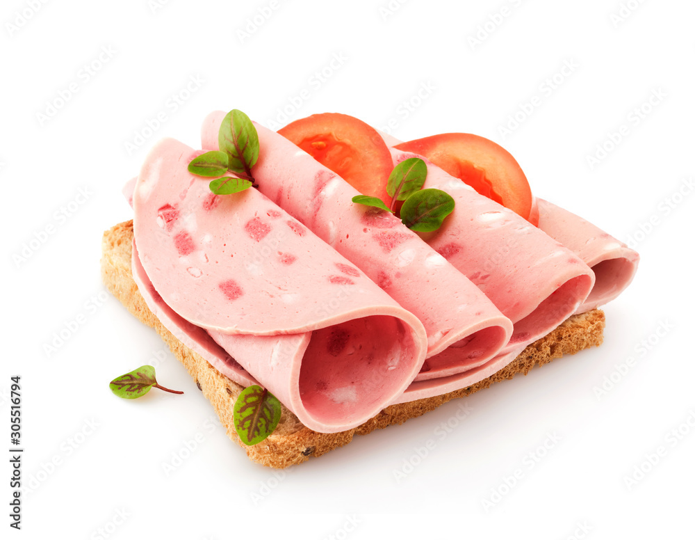 Sandwich with sliced sausage on white bread, with tomatoes and herbs. Sandwich with sliced sausage on white bread, with tomatoes and herbs.