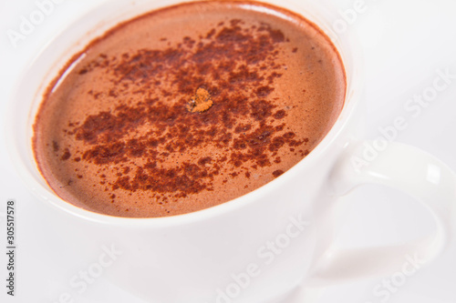 Cup of hot chocolate on a white background
