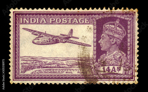 portrait of an King George VI and mail plane, indian postage stamp photo