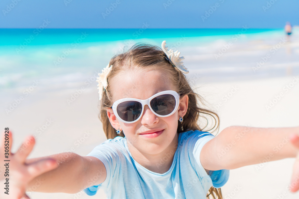 Happy kid looking at camera background beautiful sky and sea Happy kid looking at camera background beautiful sky and sea
