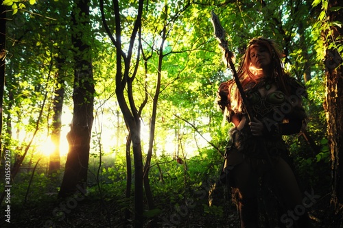 Elven warrior woman in the deep forest