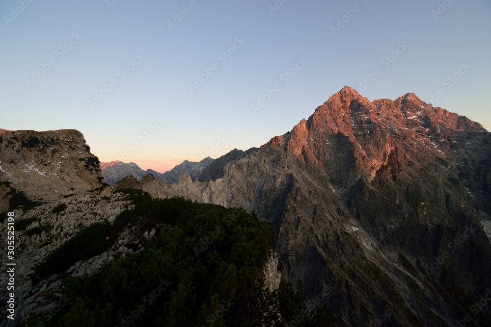 sunrise on Mt. Watzmann and its famous east face, seen from Mt. Hirschwieskopf, Berchtesgaden national park, Bavaria, Germany
