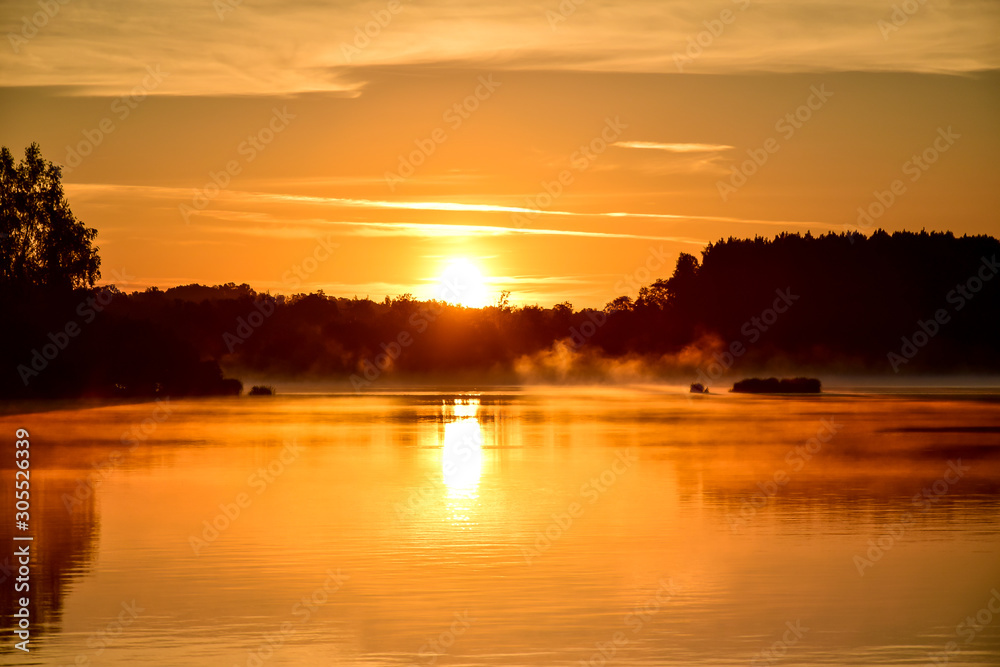 Sunset on the Daugava River in Plavinas, Latvia.