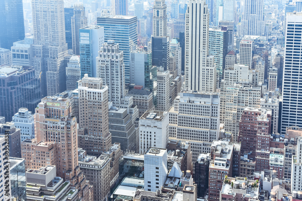 Aerial close up view of crowded buildings in New York City on a sunny day. Construction concept, crowded cities, and apartment rentals. NYC, USA Aerial close up view of crowded buildings in New York City on a sunny day. Construction concept, crowded cities, and apartment rentals. NYC, USA