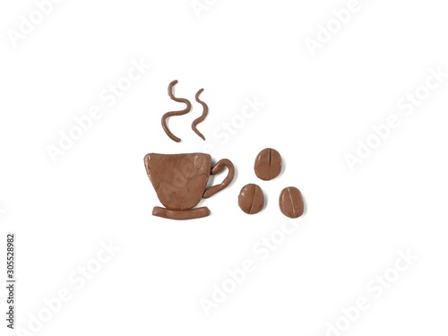 A cup of hot coffee with coffee beans are made from brown plasticine clay on white background  delicious caffeine drink dough
