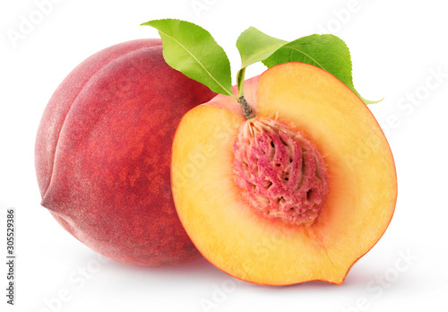 Isolated peach fruits. One whole fresh peach and a half with kernel and leaves isolated on white background with clipping path photo