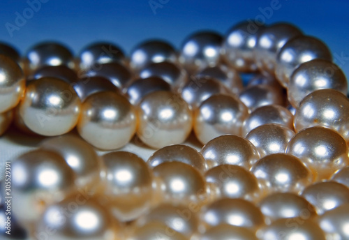 Jewelry, pearl beads photographed close-up, blurred background