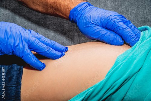 фотографія Checking for marks on the child's body