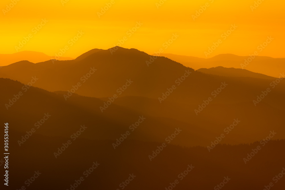 Beautiful golden sunset over the mountains.