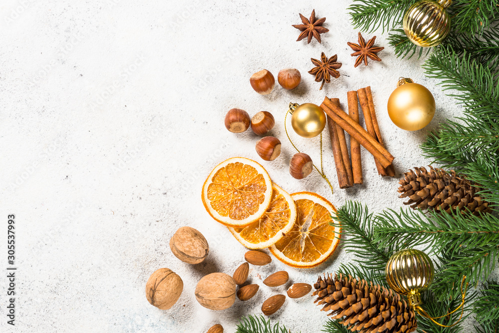 Christmas baking background with spices on white. Christmas baking background with spices on white.