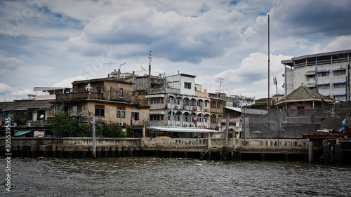 Old  wooden  traditional houses in Bangkok Chinatown alongside the Chao Phraya River