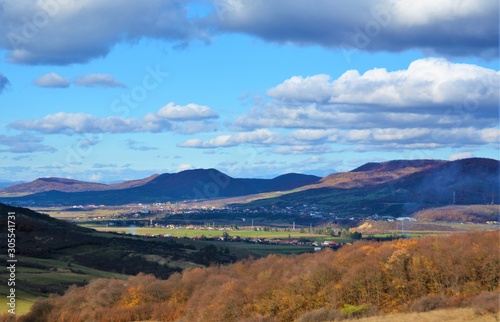 the shadow of the clouds on the hills