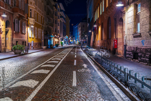 Bolzano, Italy 24 November 2019: City streets of South Tyrol under the cover of night