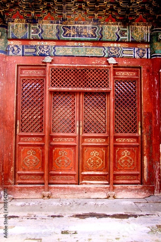 Red wooden temple doors in Mongolia