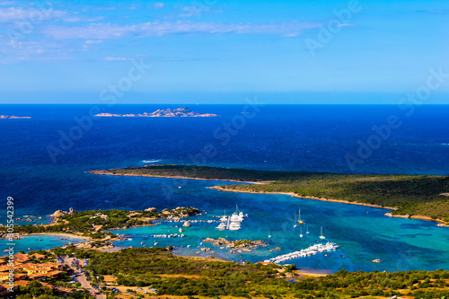 panoramic view of the gulf of marinella during a sunny summer day with the island of mortorio in the distance, Sardinia, Italy © stefano