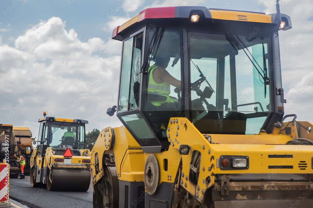 Road machinery on the construction of a road Road machinery on the construction of a road
