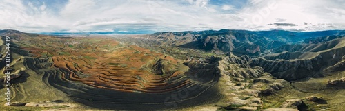Aerial panoramic 180∫ view of mountain chain and village landscape in Islallana, La Rioja, Spain
