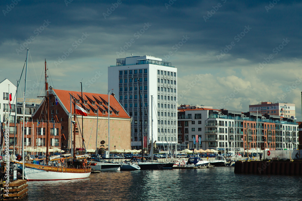Naklejka premium The Panorama view to Gdansk river bank with the yacht and buildings