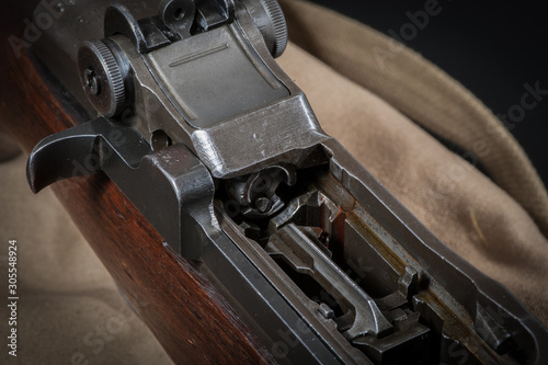 Photography M1 Garand rifle showing open bolt and follower assembly