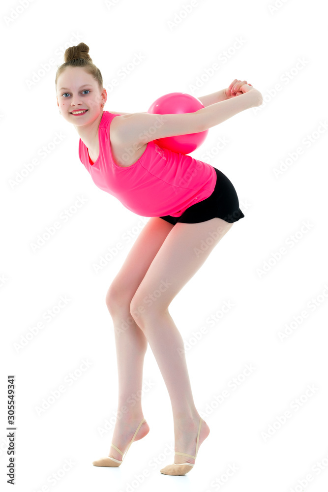 little girl is engaged in fitness with a ball. little girl is engaged in fitness with a ball.