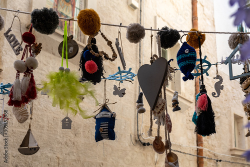 Store display with handmade souvenirs in Polignano a Mare. Apulia, Bari province, Italy,