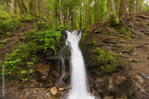 Fototapeta Naklejka Na Ścianę i Meble -  The waterfall in mountain