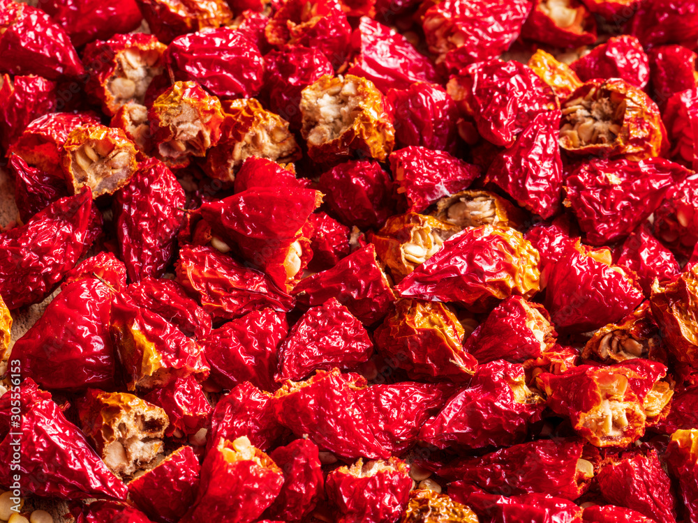 Fototapeta premium Hot and dry NuMex Red Chili Pepper at flat surface