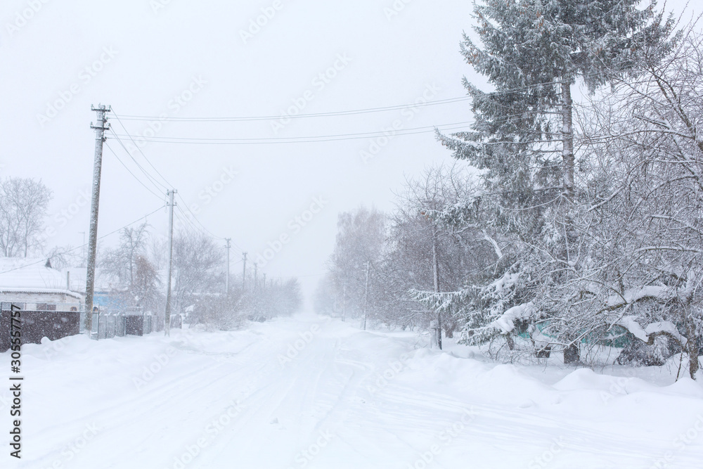 Winter, rural streets are covered with snow. Snow blizzard Winter, rural streets are covered with snow. Snow blizzard