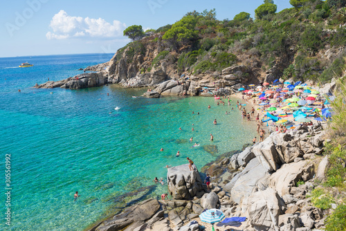 Cavoli, Isola d'Elba, Italy - September 2019: People on the famous Cavoli beach in the Isle of Elba, Tuscany