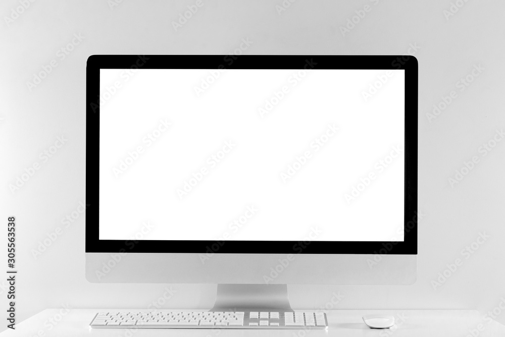 Computer all in one in office table with isolated white screen Computer all in one in office table with isolated white screen