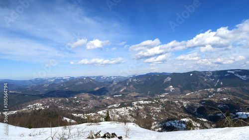 wonderful snowy mountain landscape in early spring © Serhii