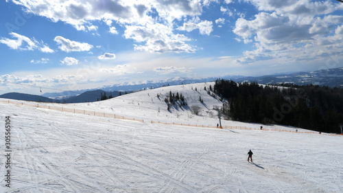 wonderful snowy mountain landscape in early spring