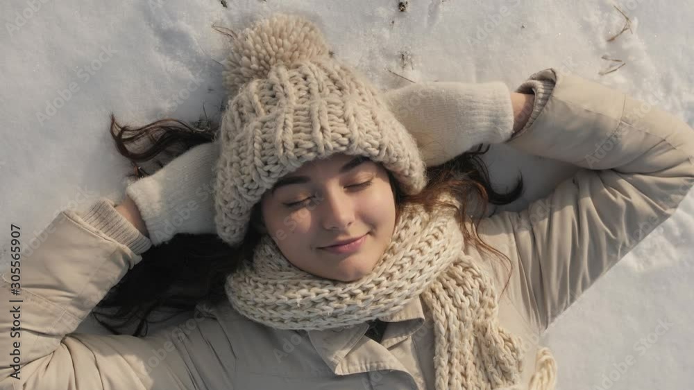 Woman Lying on the Snow
