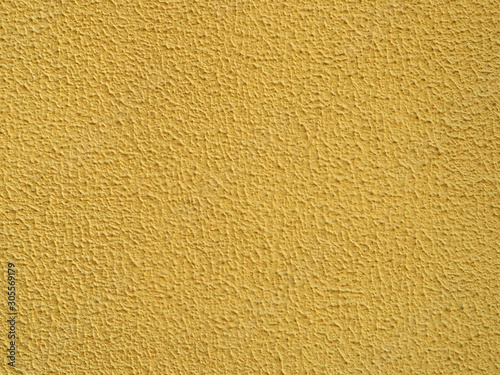 yellow texture of a wall, warm yellow background