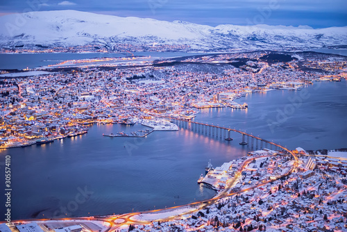 Above view of beautiful winter landscape of snow covered town Tromso