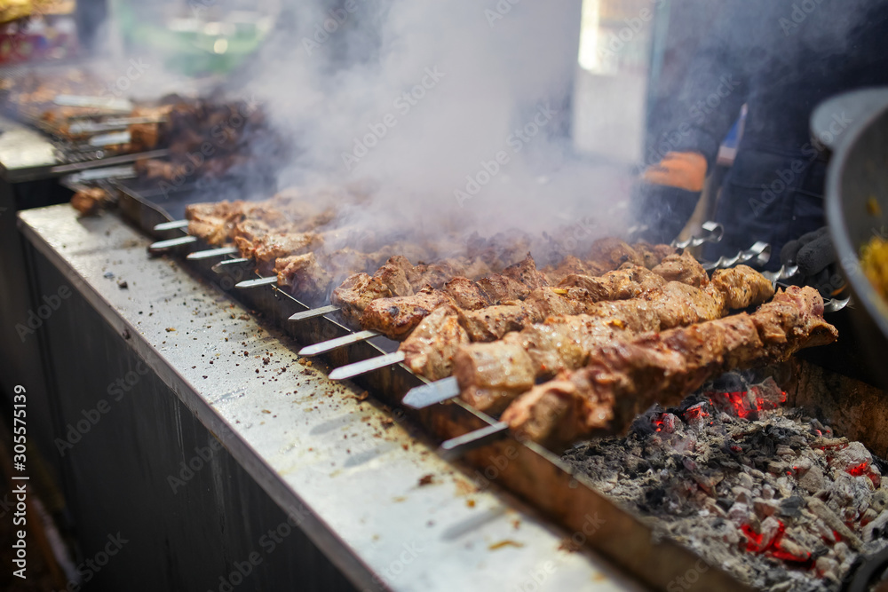 Grilled meat, barbecue. Christmas Fair. Street food. Grilled meat, barbecue. Christmas Fair. Street food.