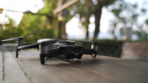 Wallpaper Mural Modern small quad copter drone with digital camera with red light refer to problem and can not take off Torontodigital.ca