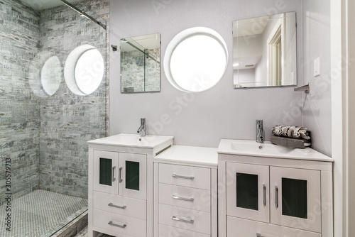 Eye-Level, angle view, Modern White and Grey Bathroom with Round windows