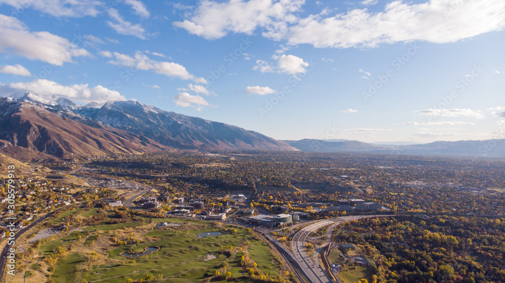 Naklejka premium Salt Lake City Skyline, Downtown Aerial Drone. Neighborhood with mountains in the background